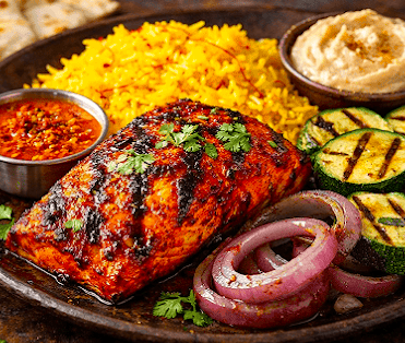 Umami Global Bistro signature dishes Tandoori Grilled Salmon
Chicken Shawarma Wrap
Kadak Chai